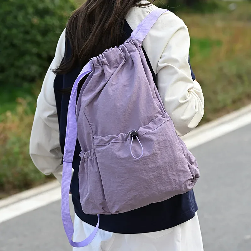 nouveau sac à dos pliable à cordon de serrage, imperméable, léger, grande capacité, sac de sport, sac de voyage portable pour la randonnée en plein air et les loisirs.