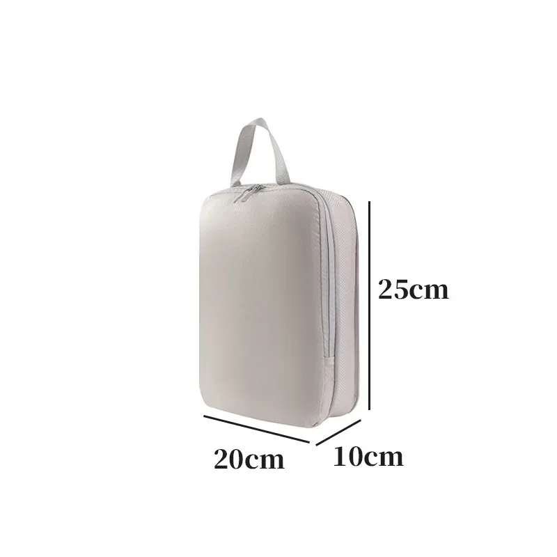 organisateur voyage polyester blanc bandes grises format rectangulaire poignées grises compression vêtements articles toilette rangement valise