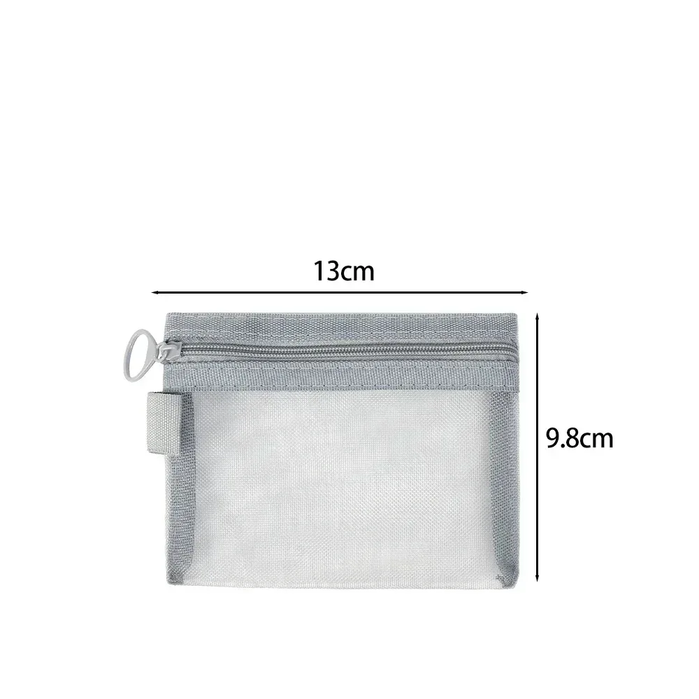 trousse toilette nylon transparente gris poignées noires poches zippées accessoires maquillage voyage usage universel