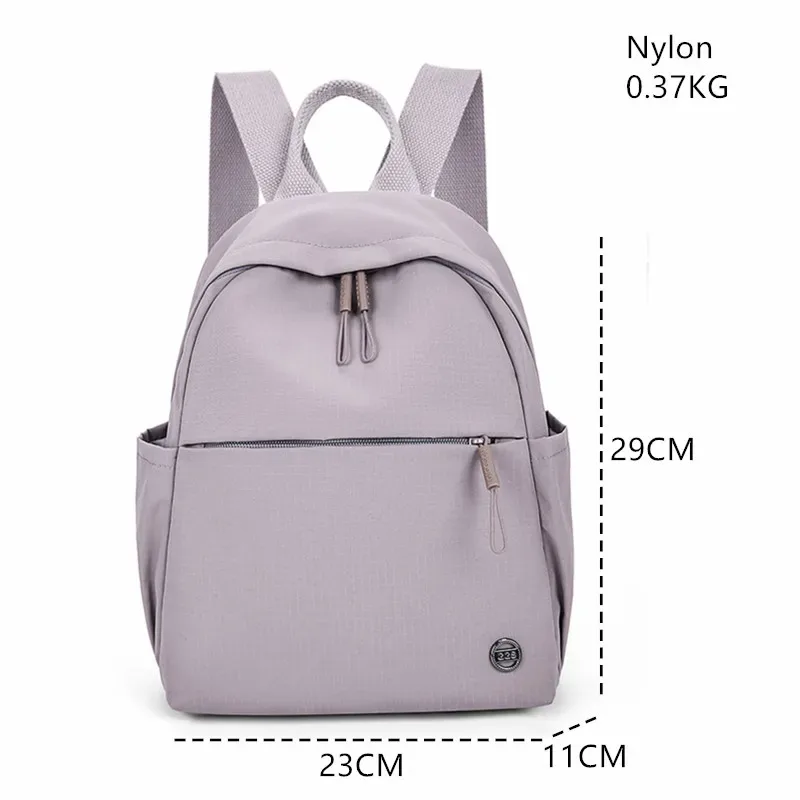 sac à dos tendance en nylon imperméable pour femmes, couleur unie, simple, loisirs, voyage, sacs à bandoulière pour adolescents