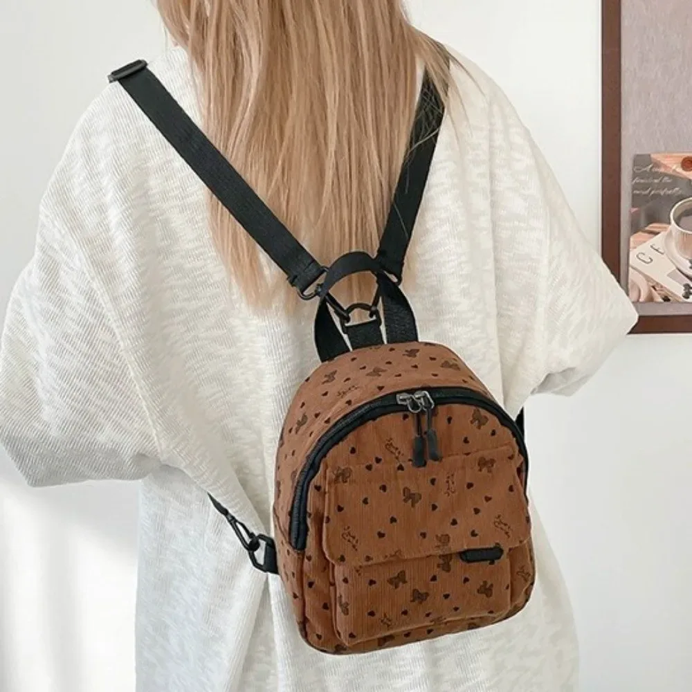 Mini sac à dos en velours côtelé léger avec imprimé cœur et nœud, décontracté, à fermeture éclair, multi-compartiments, sac à bandoulière