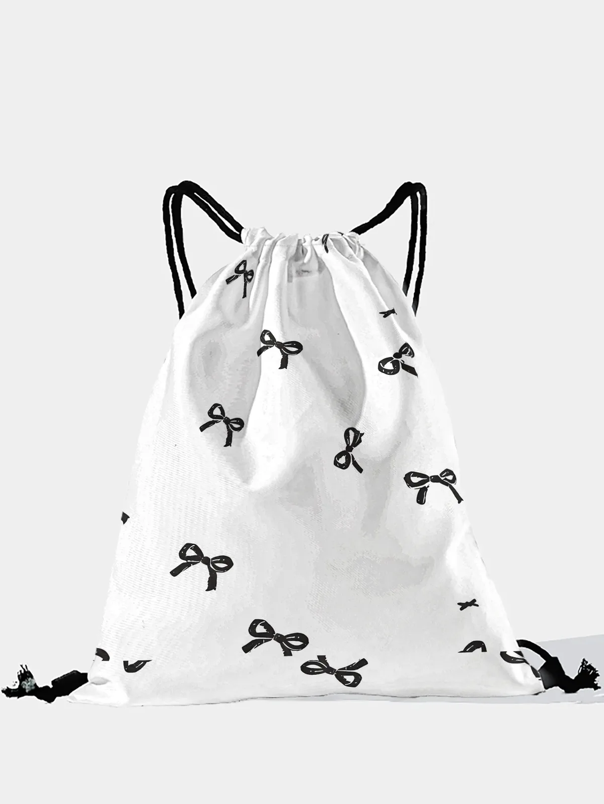 sac à dos noir à cordon de serrage imprimé nœud papillon, sac de sport léger pour la salle de sport, le yoga, les voyages, l'école, le shopping et les trajets quotidiens