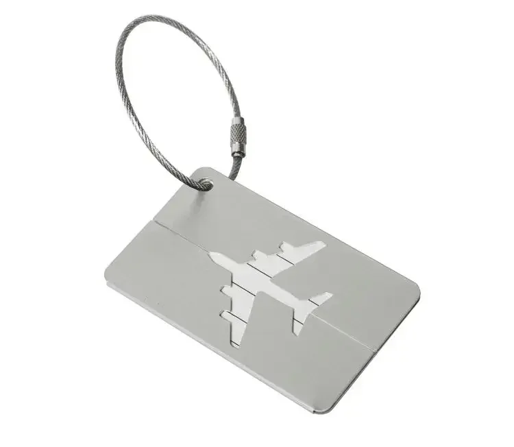 étiquette bagage métallique rectangulaire bande blanche anneau suspension couleurs variées voyage identification valise embarquement