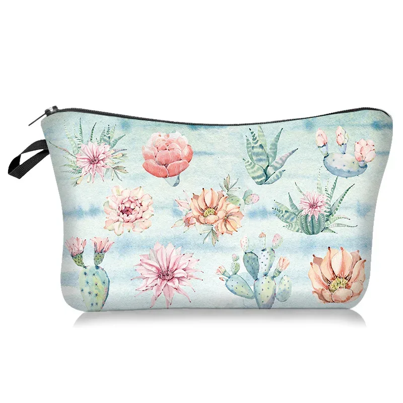 le nouveau sac de maquillage de la série à motifs légers et frais se vend bien. c'est un sac de rangement à main avec une housse en tissu polyester.