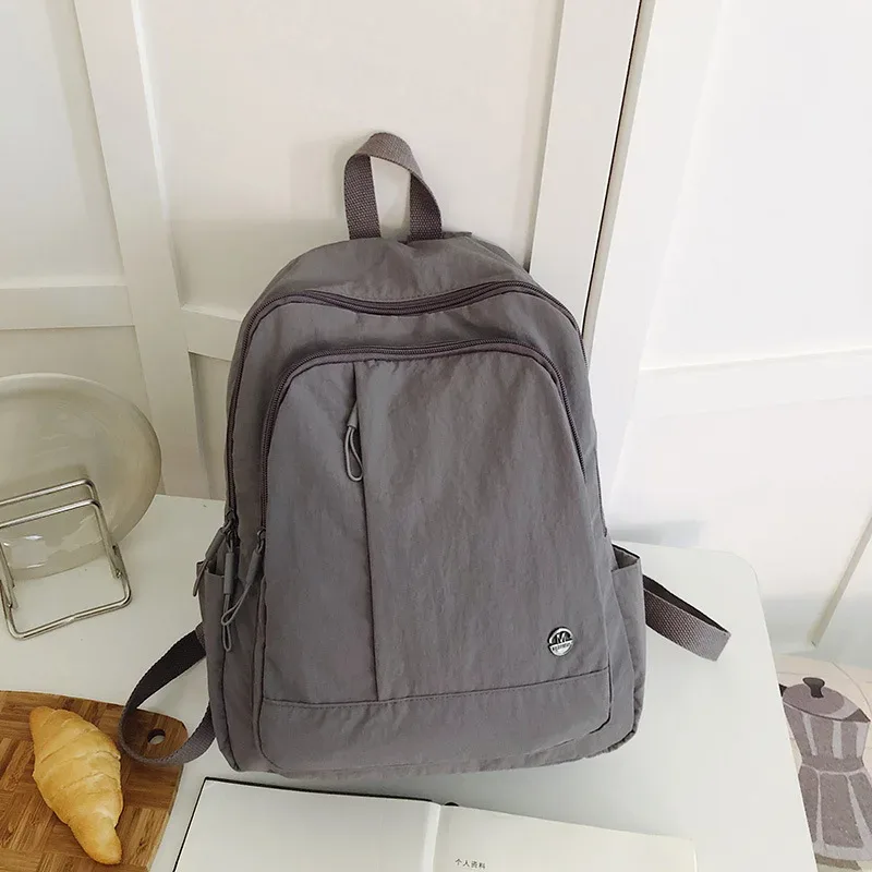 sac à dos décontracté pour femmes, léger et étanche, sac de voyage de grande capacité pour femmes, sac à dos d'école pour filles