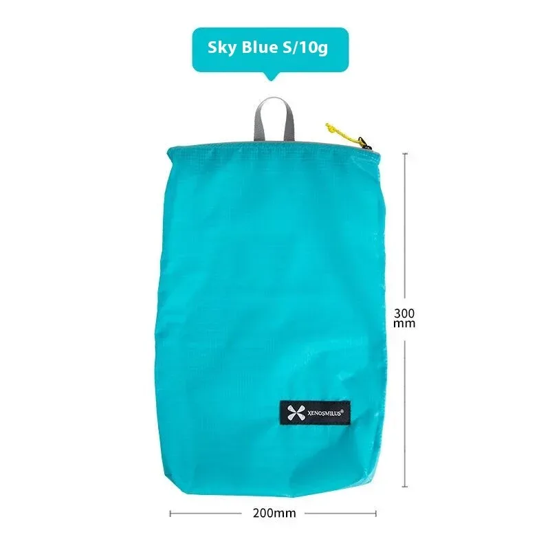 xenosmilus sac à dos de voyage portable ultra-léger avec trousse de toilette étanche, portefeuille pour passeport, pochette pour médicaments et documents
