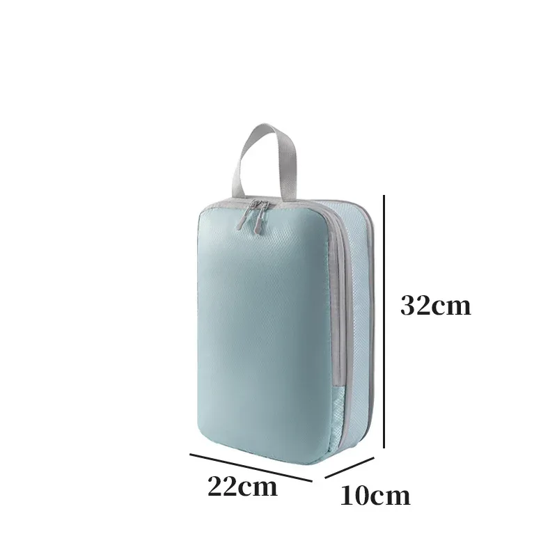 organisateur voyage polyester blanc bandes grises format rectangulaire poignées grises compression vêtements articles toilette rangement valise