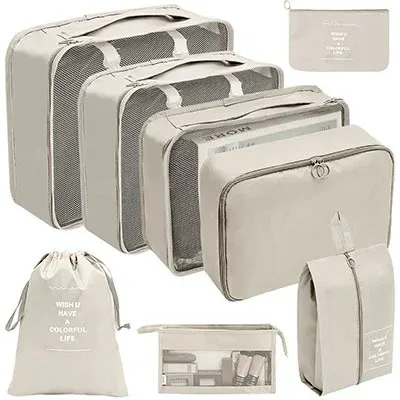 organisateur voyage polyester beige clair tissu imperméable poches maille transparente fermetures glissière poignées intégrées grande taille
