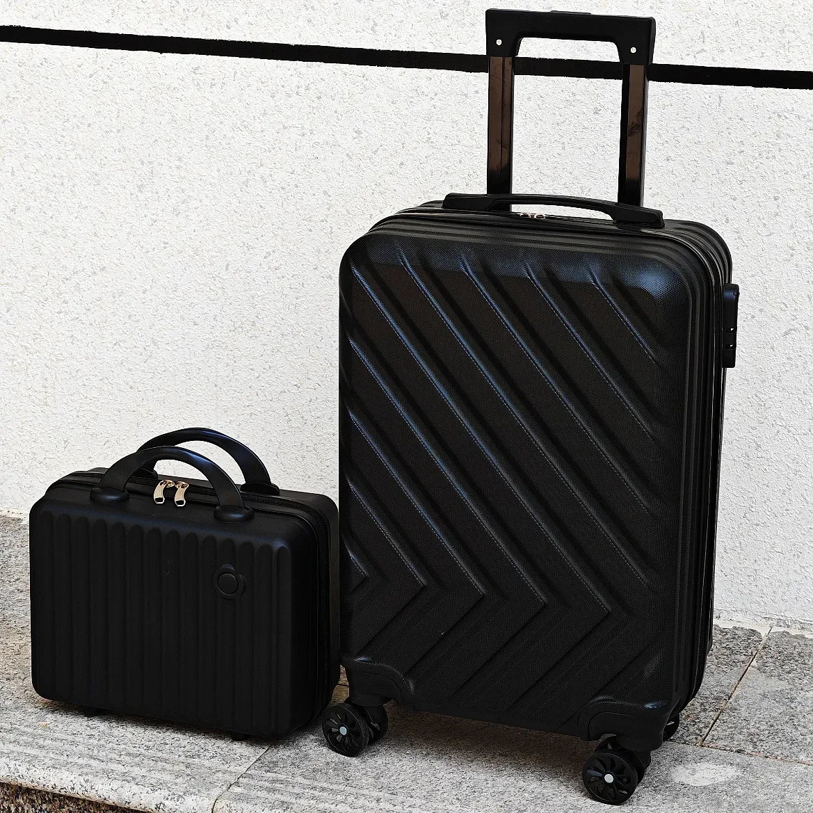valise abs noir diagonale grand format toupie poignees surdimensionnee voyage familial transport affaires capacité elevee rangement couches roues universelles telescopic