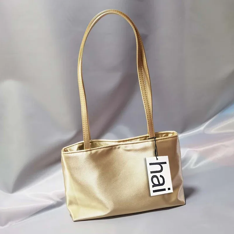 sacs à bandoulière de luxe en soie pour femmes, sac carré sous les bras, sac de banlieue de marque célèbre, fourre-tout macaron de couleur contrastée