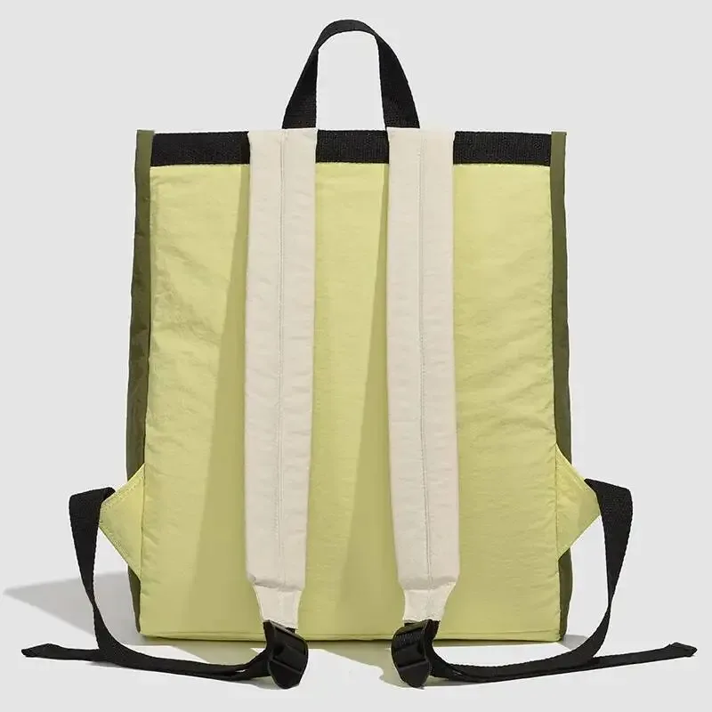 sac dos nylon vert olive jaune citron bandoulière rétractable poche intérieure imperméable usage voyage