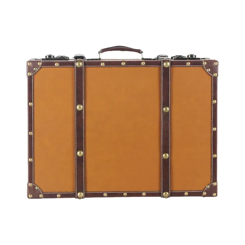 valise pu cuir simili vintage ligne verticale verde foncée roulettes poignées cuir marron rivets dorés voyage décoration maison