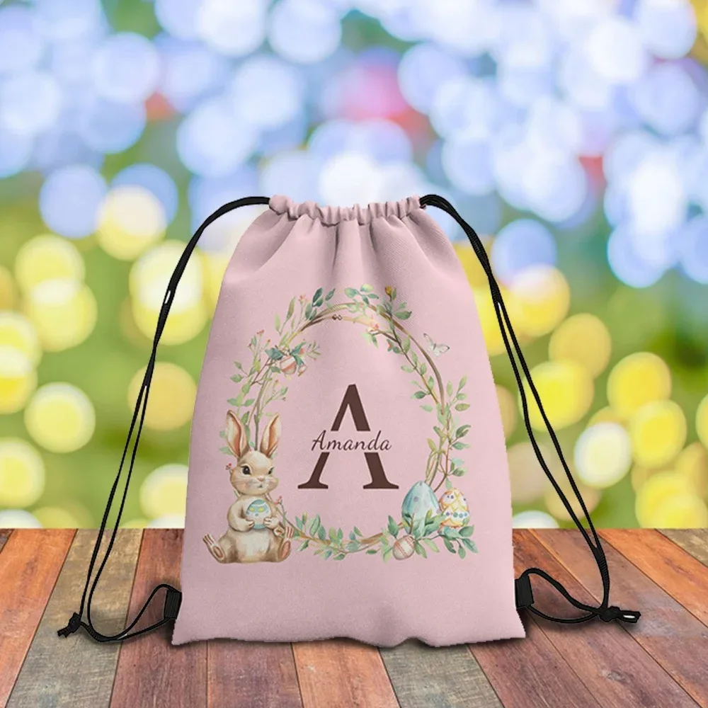 sac à dos à cordon personnalisable sur le thème de pâques, disponible en 4 couleurs fraîches au choix, personnalisé avec un nom unique – idéal pour les fêtes !