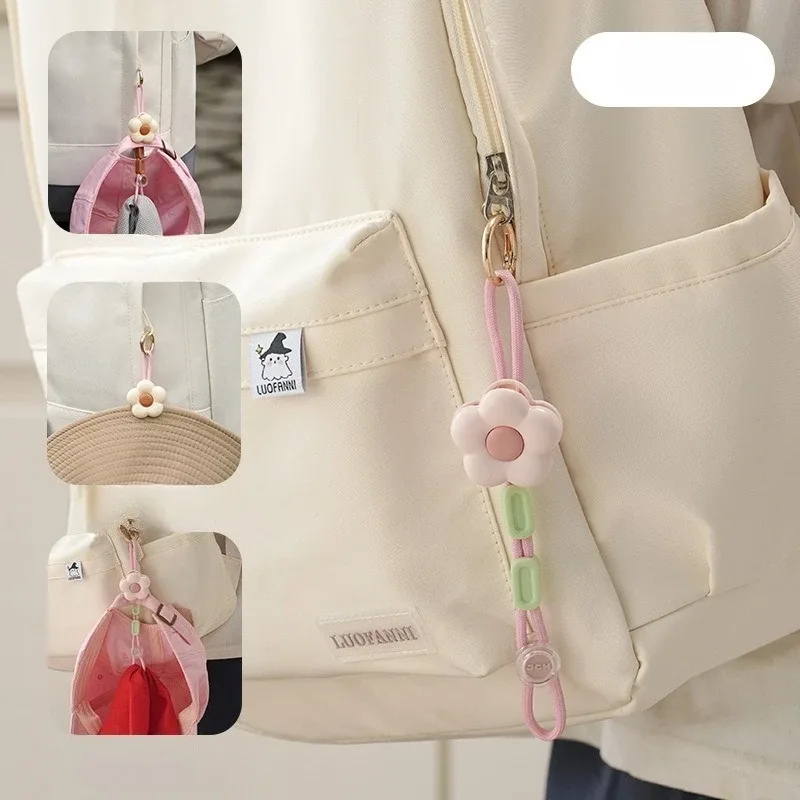 pince chapeau plastique fleurs couleurs marron rose dore attachement sac antichute voyage pratique simple