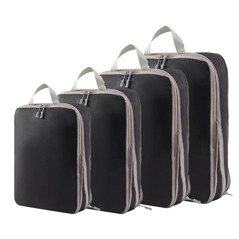 organisateur voyage polyester blanc bandes grises format rectangulaire poignées grises compression vêtements articles toilette rangement valise