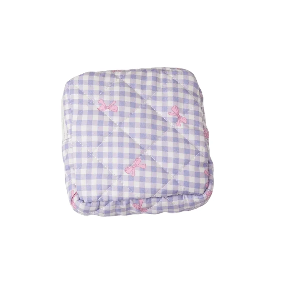 sac de rangement pour serviettes hygiéniques à motif à carreaux, sac cosmétique multifonctionnel, mini sac de voyage matelassé portable pour maquillage.