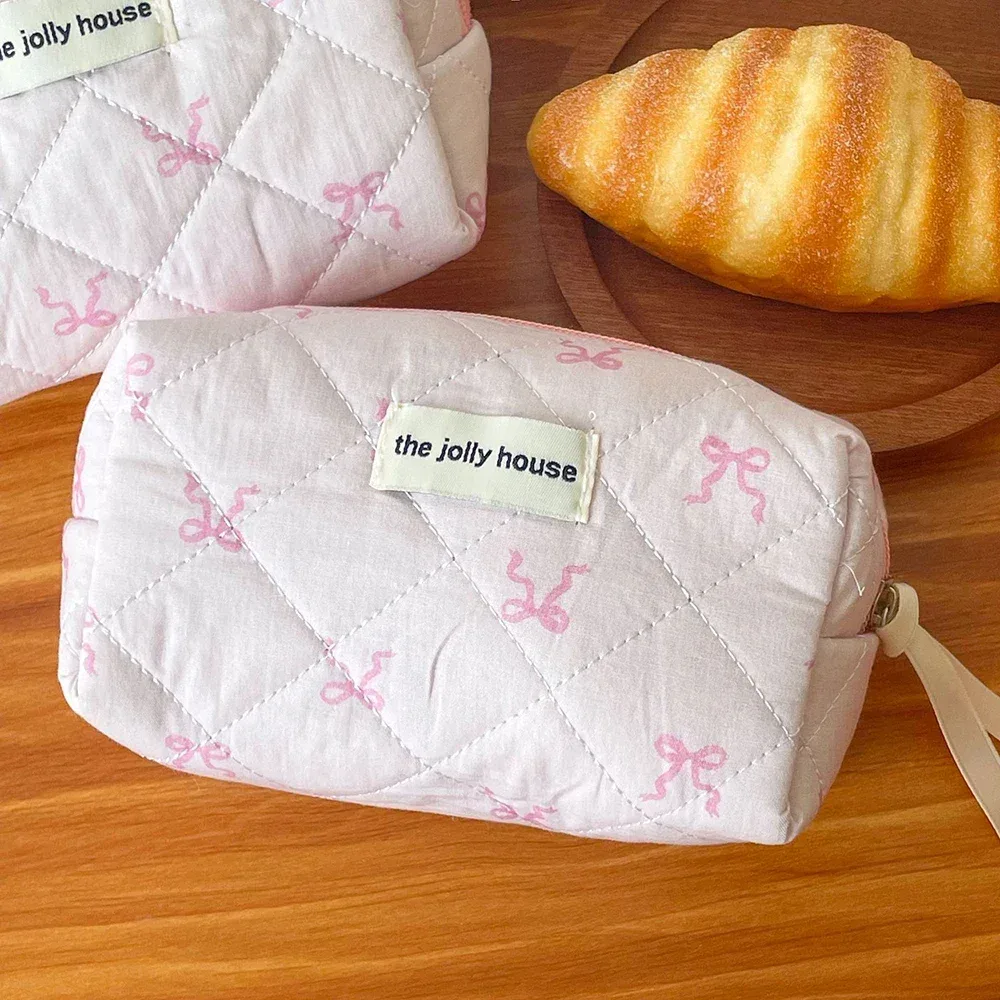 trousse cosmétique tissu coton rose pâle motif rubans matelassée fermeture glissière voyage femmes maquillage