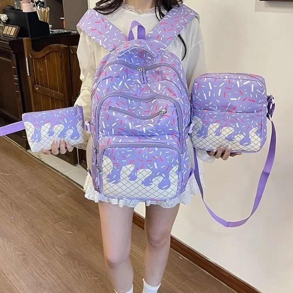 sac dos toile oxford motifs crème glace couleurs roses blanches format petit taille grande capacité bandoulière trousse crayons usage étudiant sortie