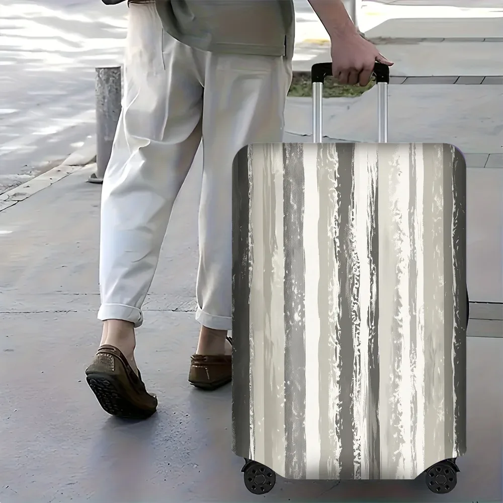 housse valise polyester gris beige vertical rayures abstraites leger rugueux voyage temps compact transport voyageur