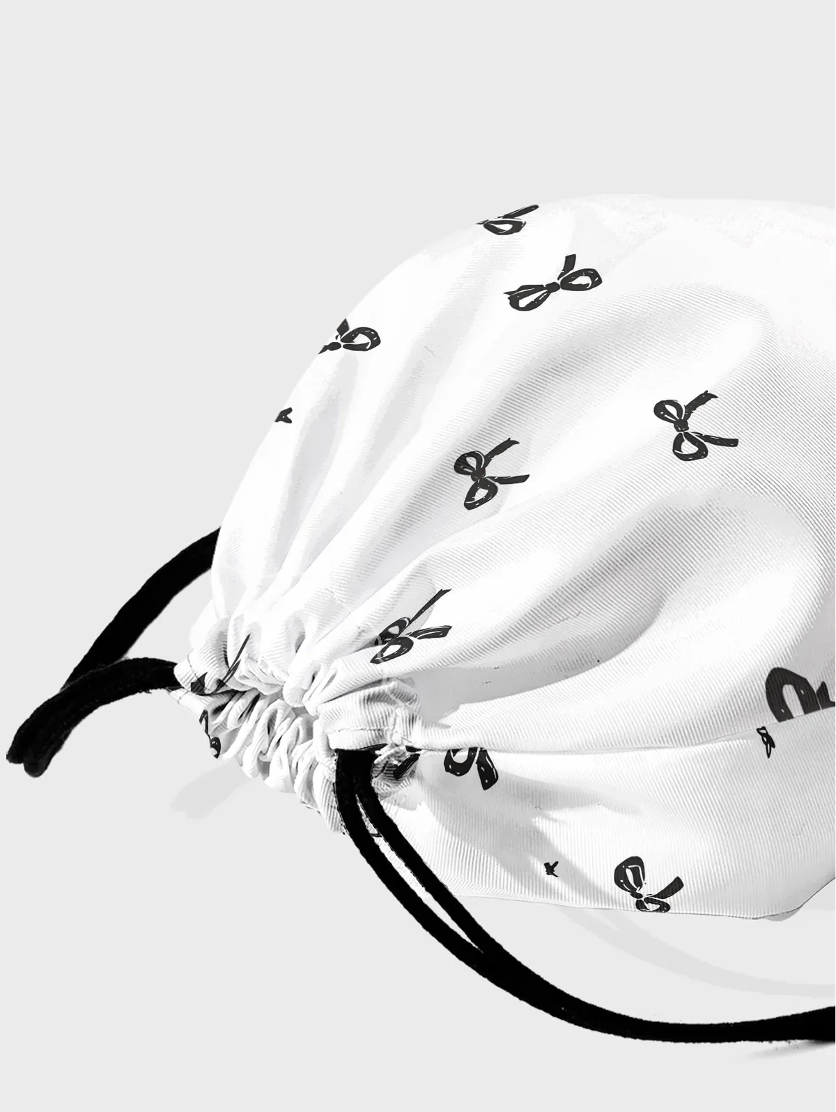 sac à dos noir à cordon de serrage imprimé nœud papillon, sac de sport léger pour la salle de sport, le yoga, les voyages, l'école, le shopping et les trajets quotidiens
