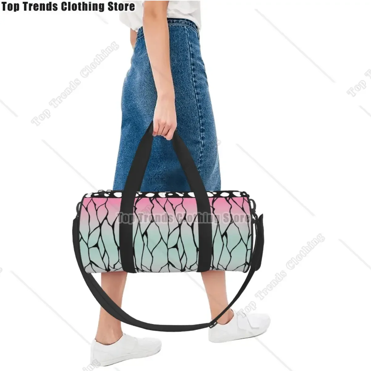 sac voyage polyester motif lignes noires couleurs pastel rose vert bleu poignée bandoulière supérieure ajustable format sport rond usage week-end fitness