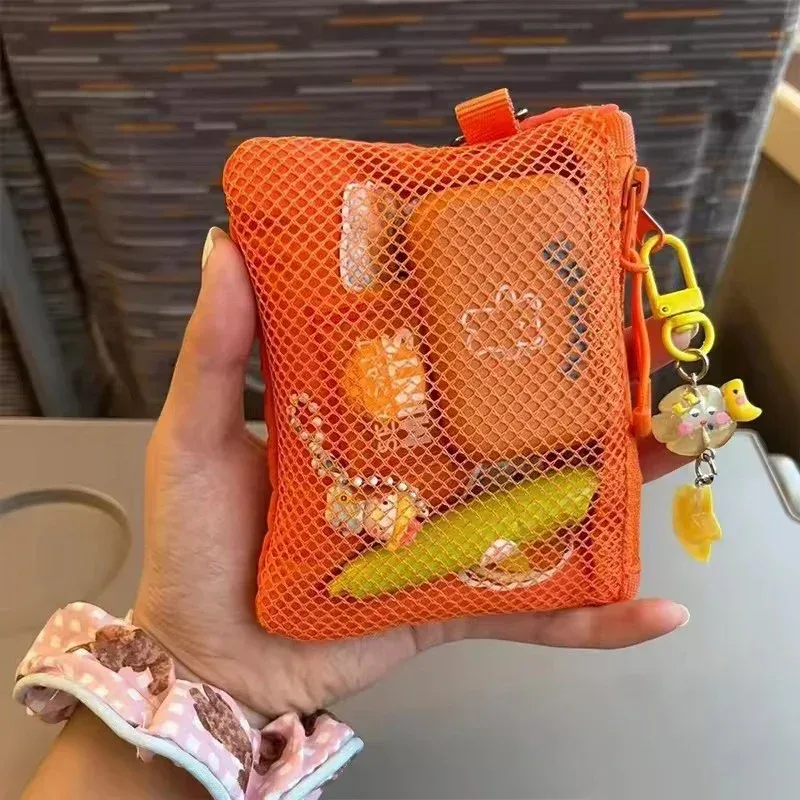 organisateur voyage polyester gris blanc orange jaune perles canard porte clés petit sac carré ovale rectangulaire cosmétiques transport pratique compact