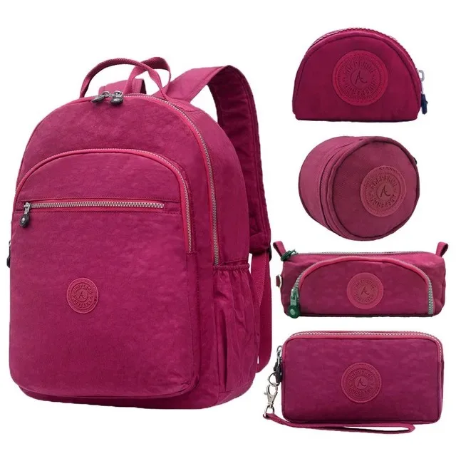sac dos nylon gris anthracite compartiments poches latérales glissière accessoires pompon porte monnaie voyage école adolescente