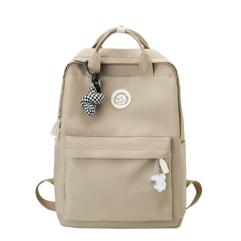 sac à dos léger et imperméable pour femmes, grande capacité, couleur unie, sac d'école en nylon, sac à dos ergonomique de voyage et de loisirs