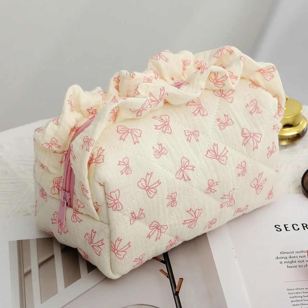 sac de maquillage imprimé floral avec nœud papillon à bord ébouriffé, sac à stylos matelassé de grande capacité, sac de rangement de cosmétiques pour femmes, sac de lavage de voyage, pochette