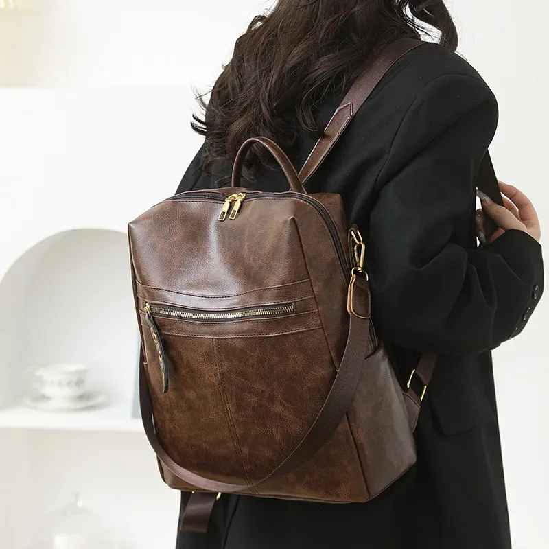 sac dos pu vintage femme marron noir beige polyester zippé bandoulière amovible compartiment intérieur