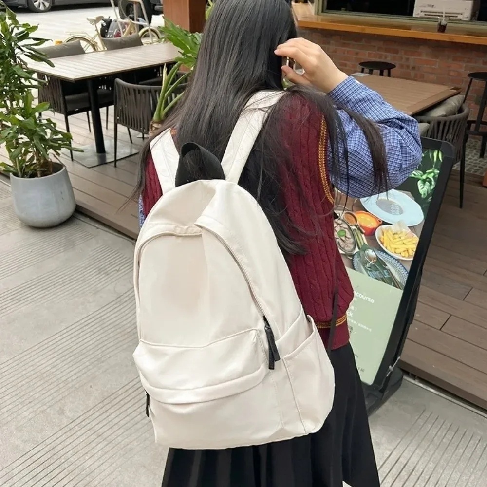 sac à dos d'étudiant moderne de grande capacité, sac d'école décontracté en nylon, couleur unie, bretelles réglables, sac de voyage, école