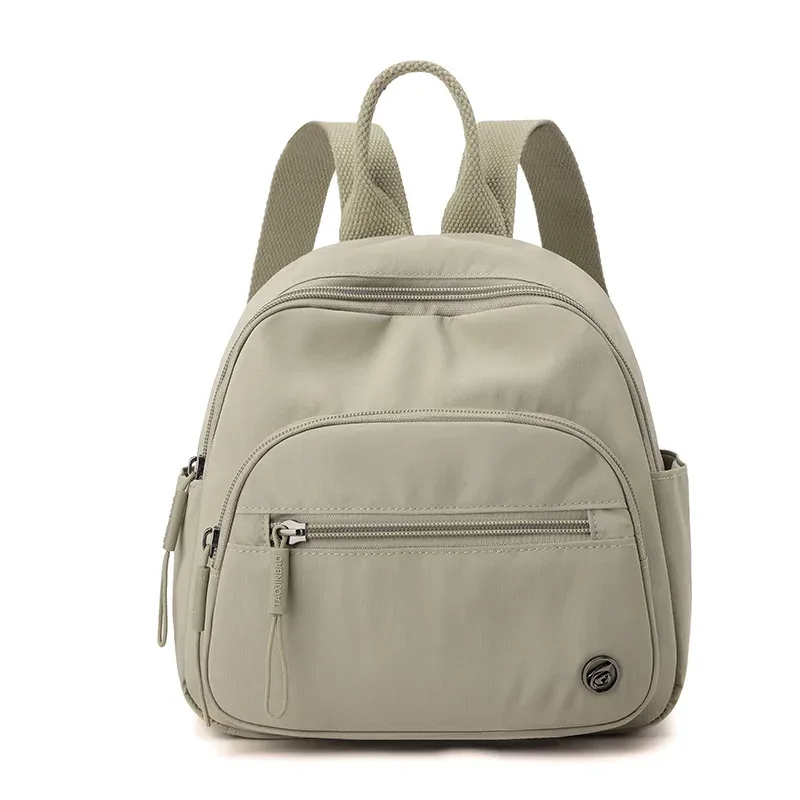 sac à dos portable en nylon pour femme, couleur unie, léger, multi-poches, décontracté, tendance, imperméable, nouveau cadeau 2026