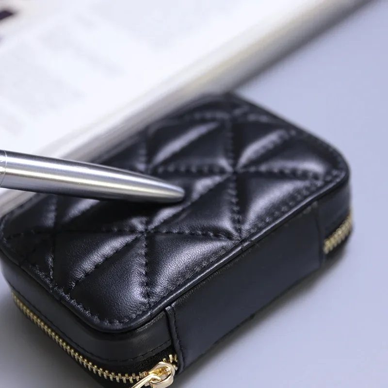 organisateur voyage cuir vache motif rayé blanc noir rose bleu carré zip décontracté cosmétiques maquillage