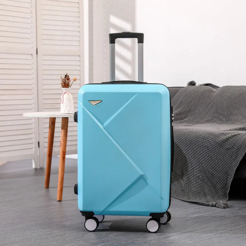 valise abs plastique dur motif géométrique lignes diagonales relief gris rose blanc jaune vert bleu rouge bagage affaires voyage