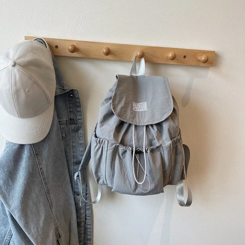 nouveau sac à dos décontracté 2026 pour femme, léger et simple, grande capacité, idéal pour les étudiants et les trajets quotidien en extérieur
