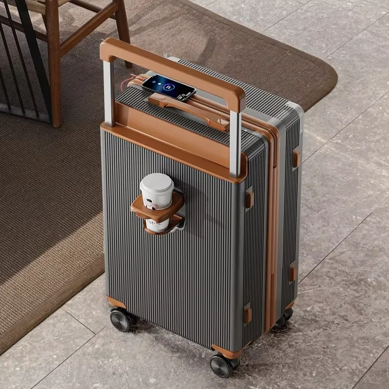 valise bagage roulettes abs beige clair marron toupie poignées bouton forme rectangulaire surface lisse texturée grande capacité usage voyage
