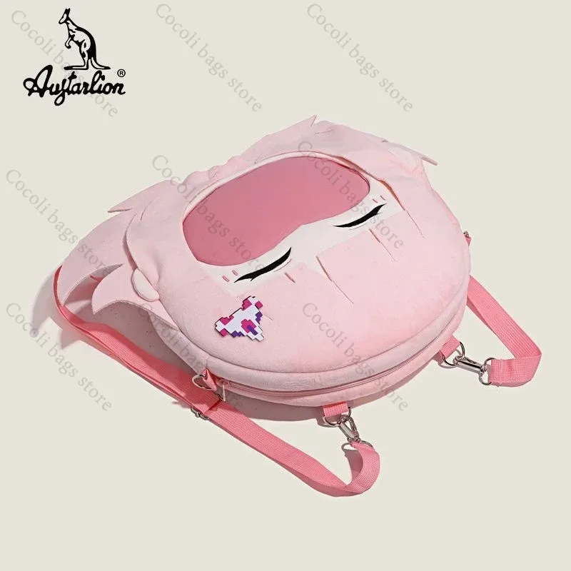 sac dos polyester rose dessin animé souriant avion pixelisé forme arrondie poignée souple compartiment intérieur usage voyage filles