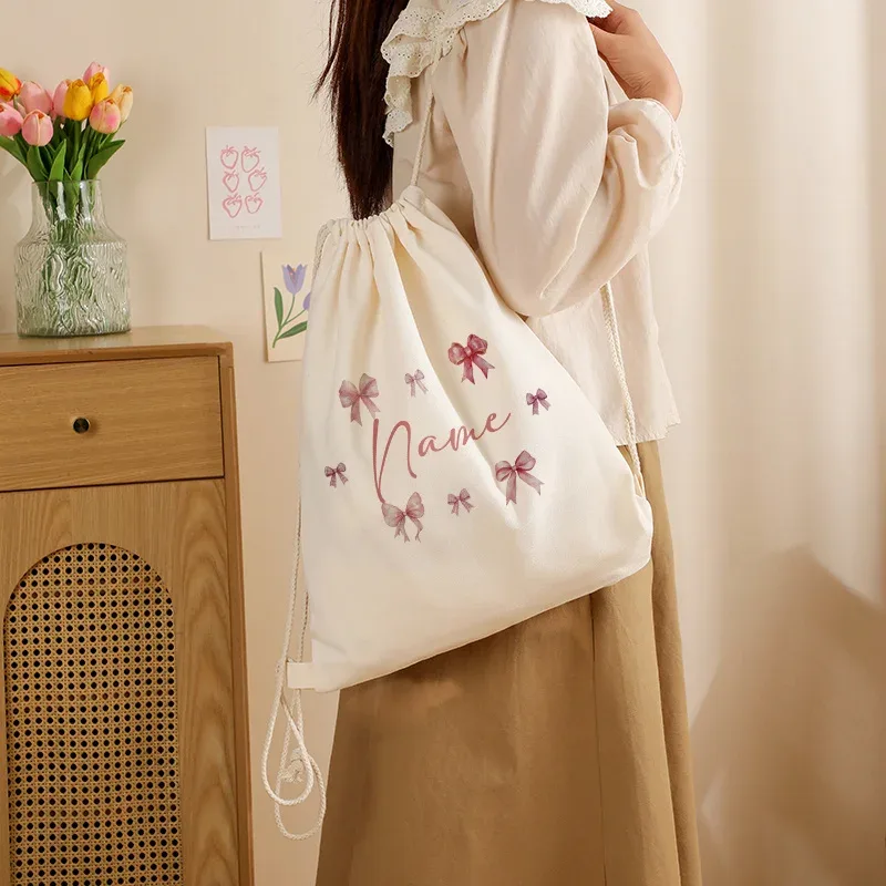 sac à dos personnalisé à cordon de serrage avec imprimé violet et nœuds personnalisés, sac de sport réglable adapté aux voyages sportifs, léger