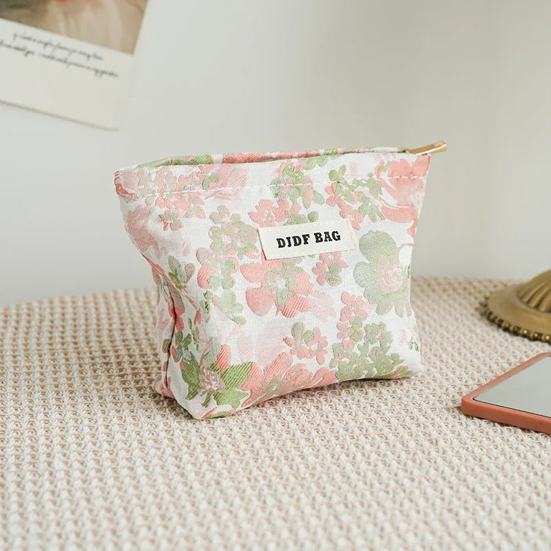 trousse polyester motif floral fleurs roses vertes fond blanc fermeture éclair voyage femmes cosmétiques maquillage sac rectangulaire