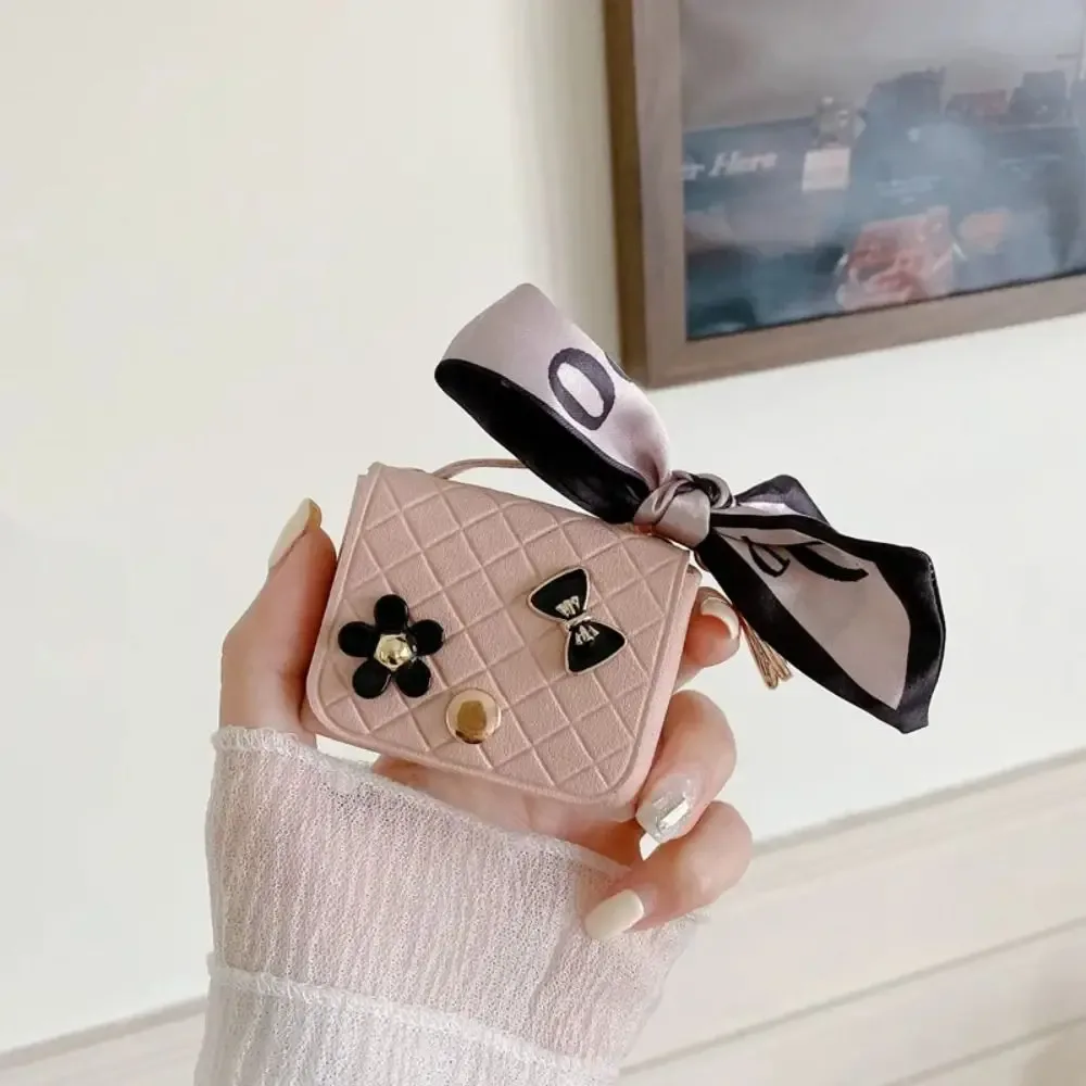 nouvelle pochette de rangement en cuir 2026 pour écouteurs, mini porte-clés créatif, pendentif couleur unie, étui pour écouteurs bluetooth