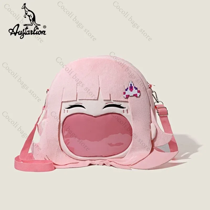 sac dos polyester rose dessin animé souriant avion pixelisé forme arrondie poignée souple compartiment intérieur usage voyage filles