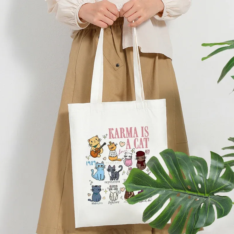 swifitie karma est un chat modèle sacs fourre-tout pour femmes pliable grand sac à main de voyage d'été pour les filles retour à l'école cadeau sac de plage