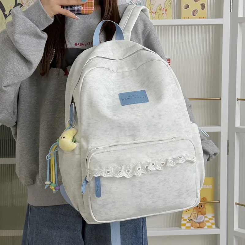 nouveau sac à dos de voyage 2026 en dentelle style japonais ins léger grande capacité pour femme, sac d'école respirant en nylon imperméable