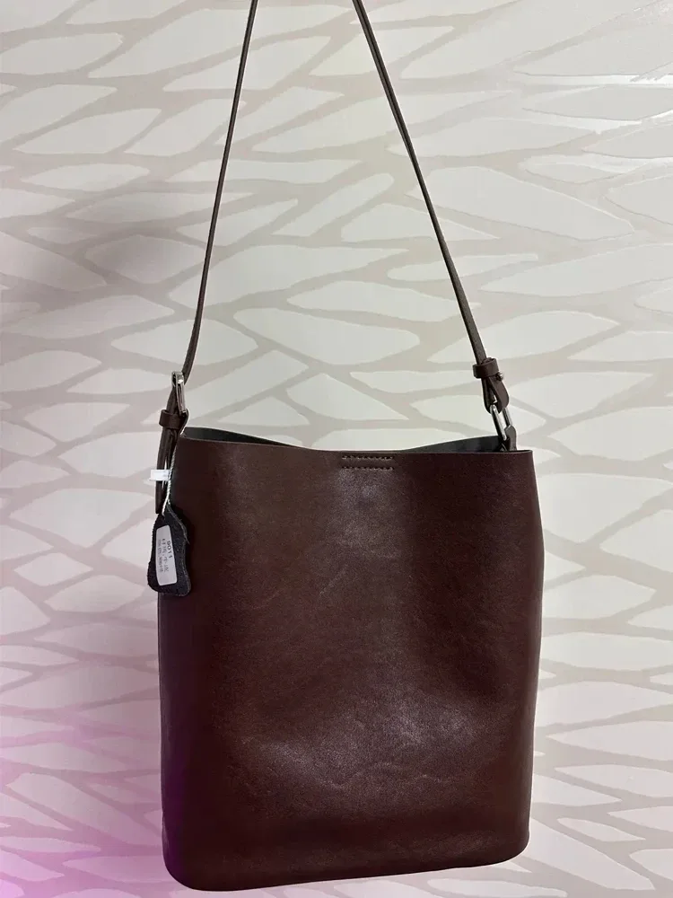 rétro véritable peau de vache 2025 nouveau sac à bandoulière en cuir sac fourre-tout pour les femmes mode sac seau capacité sac à bandoulière sac d'été