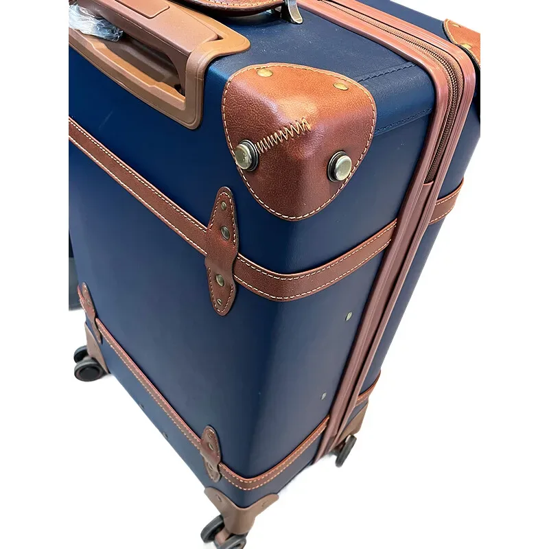 valise polypropylène bleu marron poignées latérales roulettes spinner intérieur beige rayé bagage voyage universel