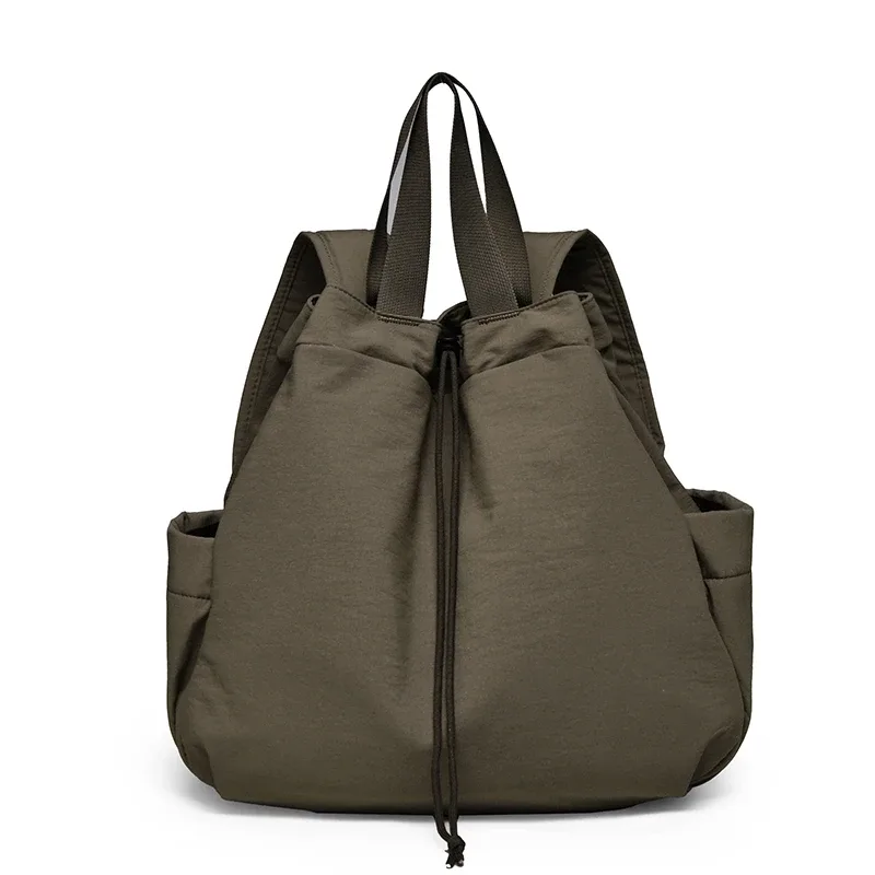 sac dos nylon beige orange jaune femelle trapézoïdale poignée amovible poches boutons glissière latérale voyage