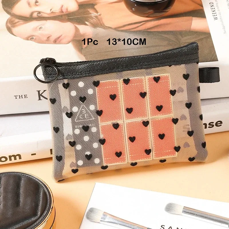 trousse toilette nylon transparents coeurs noirs fond gris petit moyen grand voyage cosmétiques maquillage