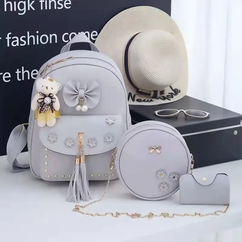 sac dos cuir synthétique gris motif géométrique relief bandoulière amovible porte-monnaie inclus voyage femme