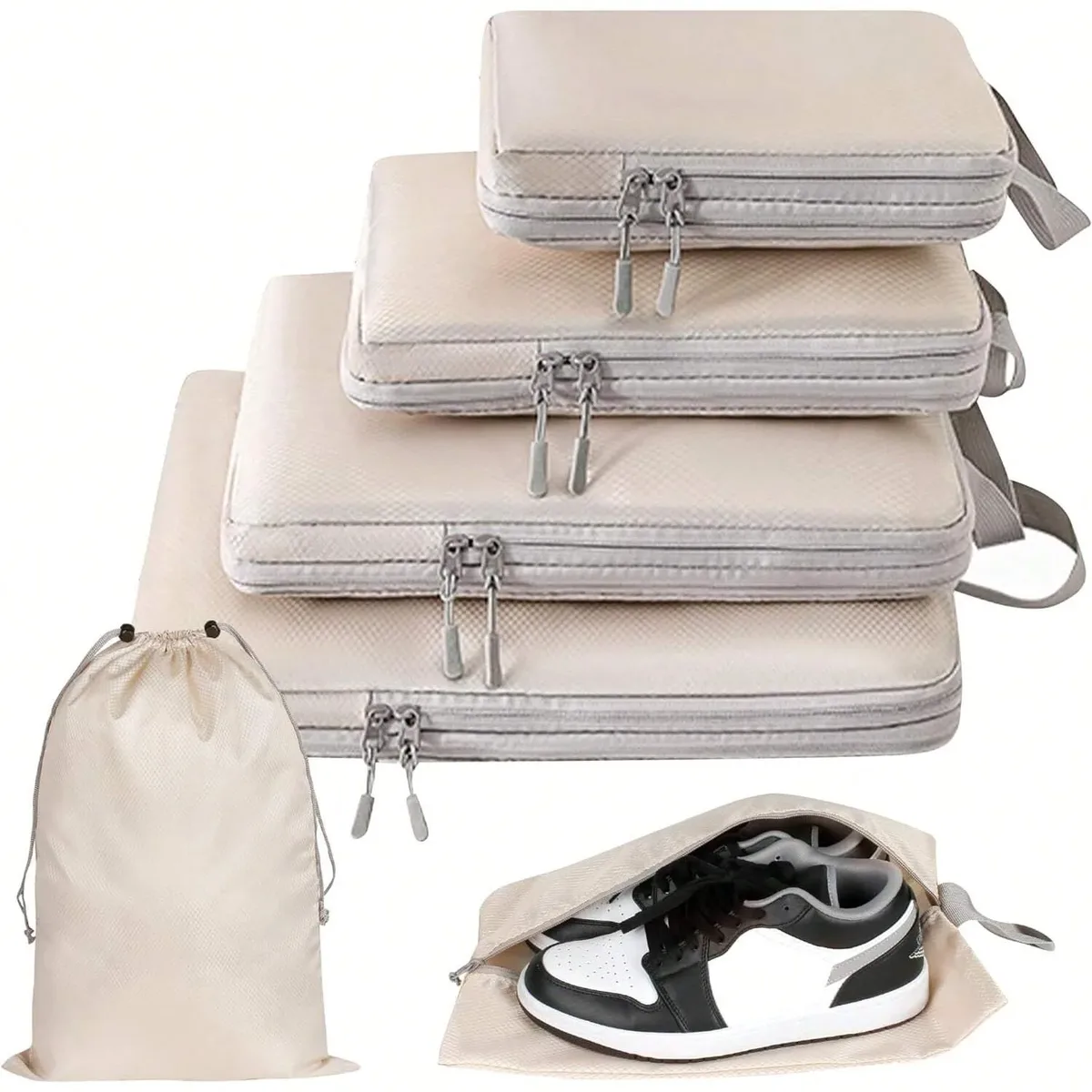 organisateur voyage polyester gris clair poignée noire fermeture glissière compressible sac chaussures rangement cube traçabilité usage polyvalent