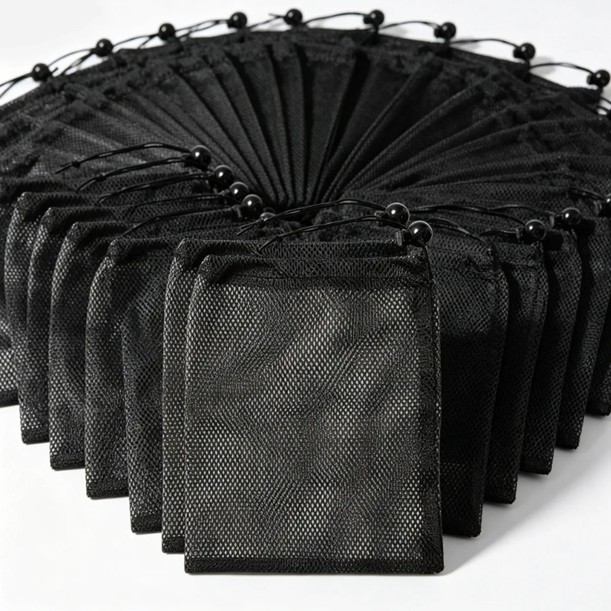 organisateur voyage sac rangement nylon noir sport maille serrage cordon 30x40cm compression usage transport